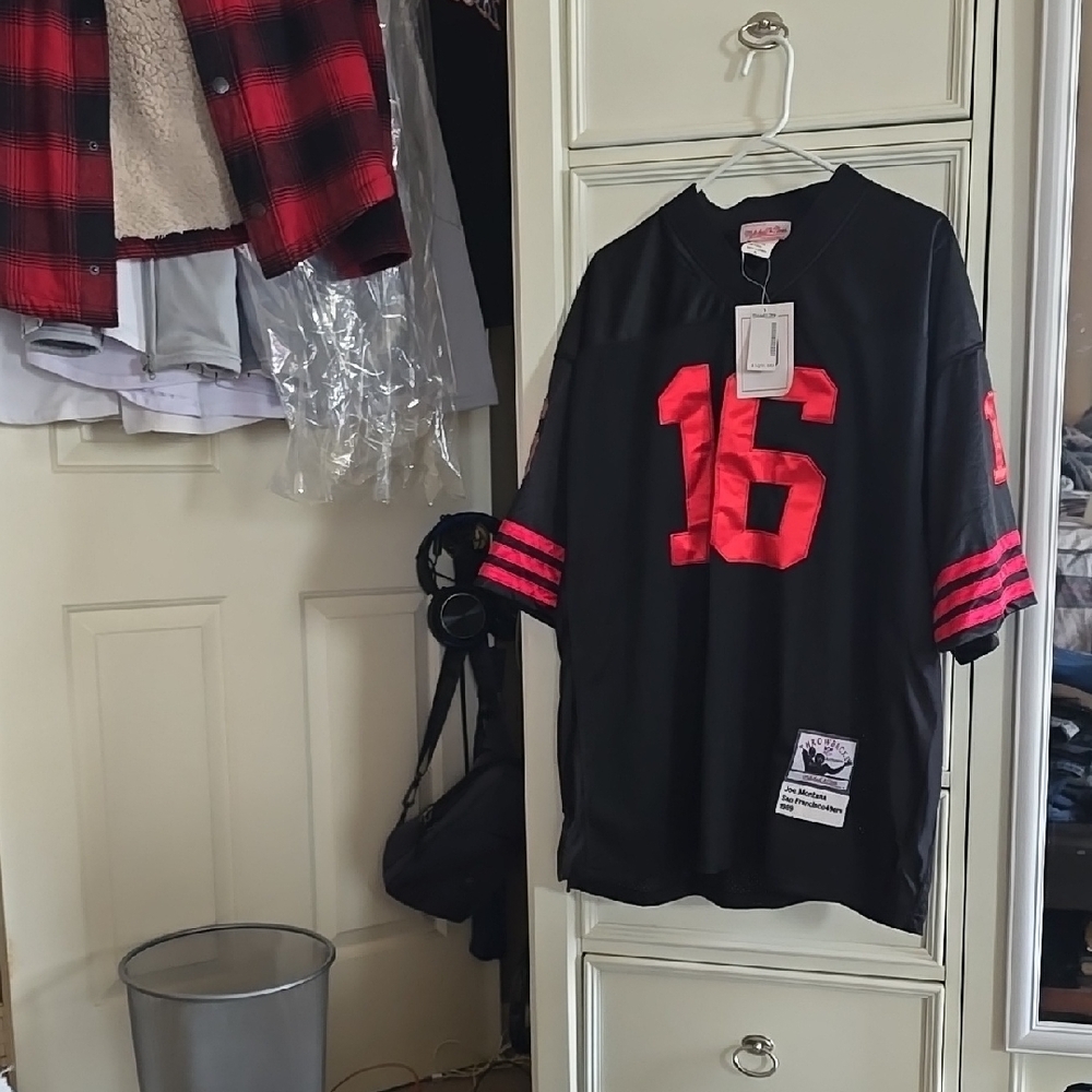 Black Jersey with Red Number 16